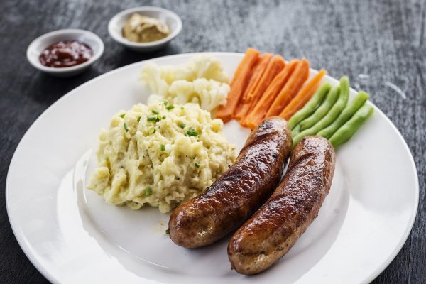 german sausage with mashed potato and vegetables simple meal